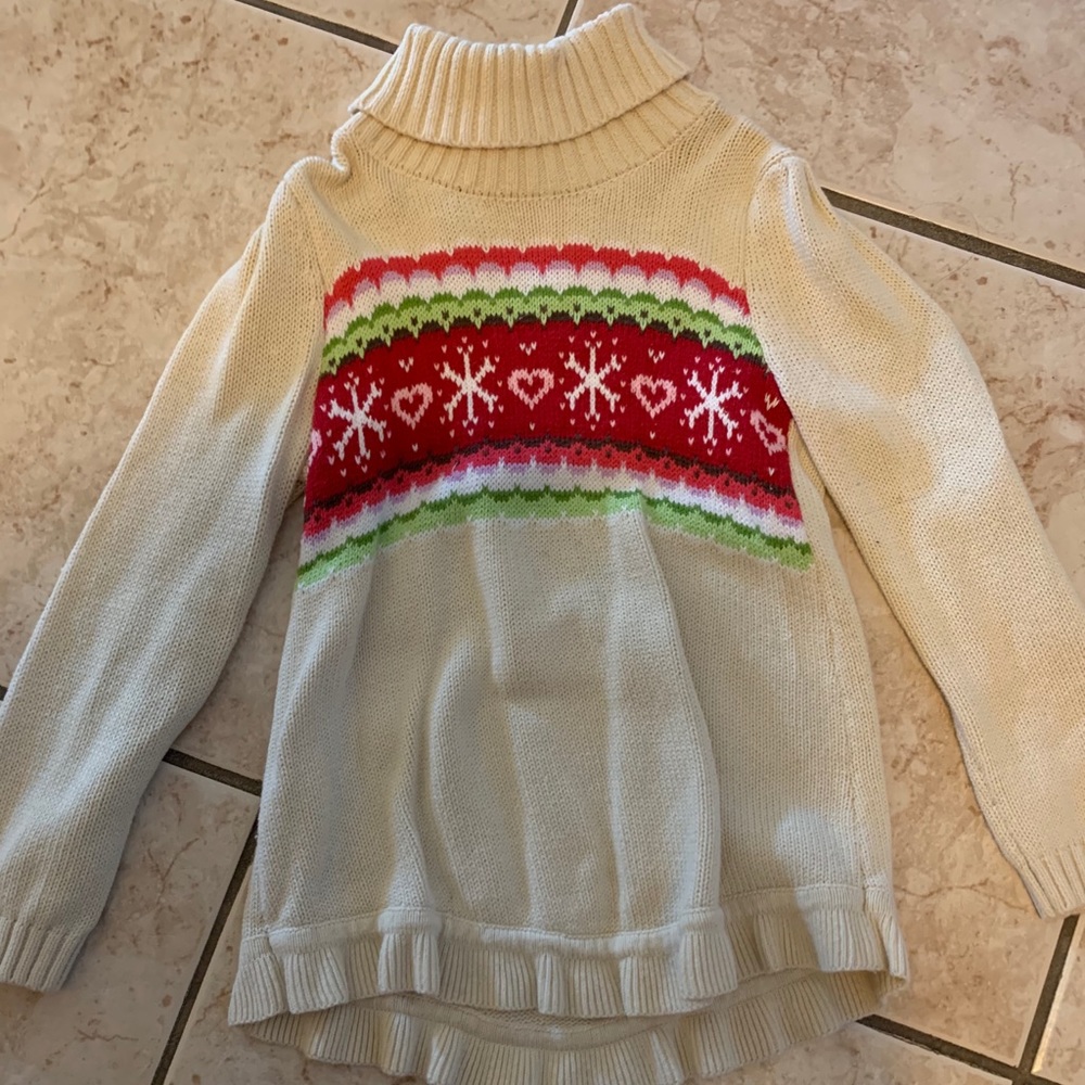 Girls tan turtleneck.